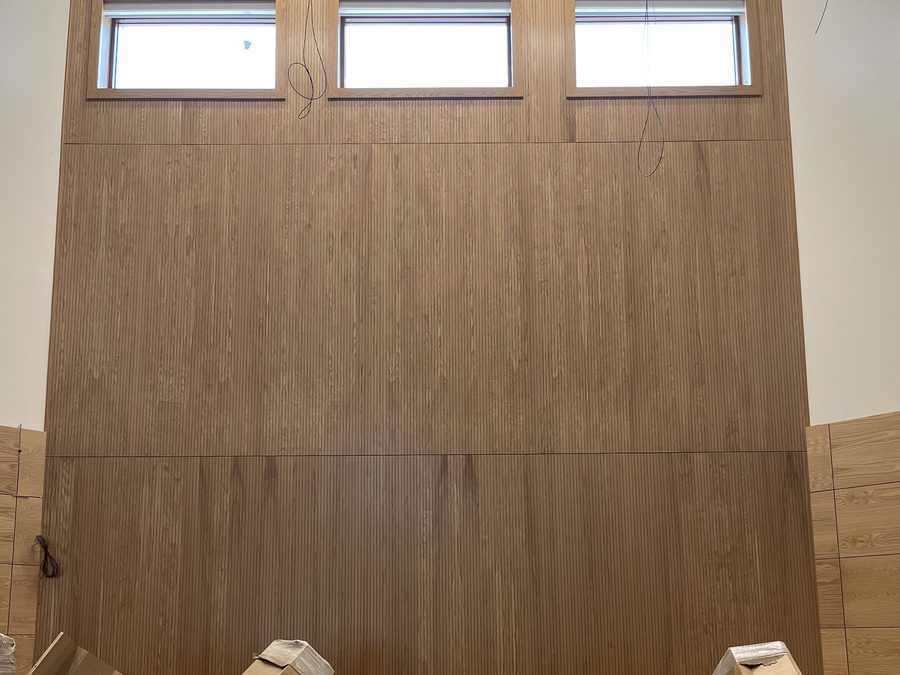 Full-height wood wall panel feature